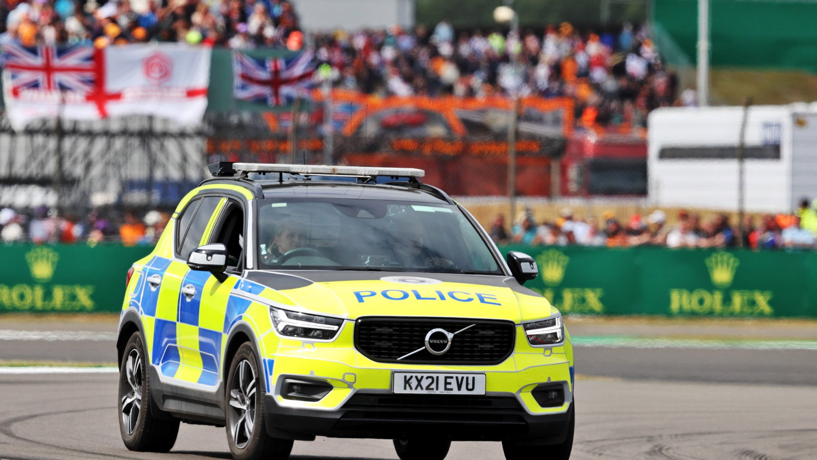 Police on the circuit at the start of the race as an incident involving people attempting to enter the circuit. Formula 1