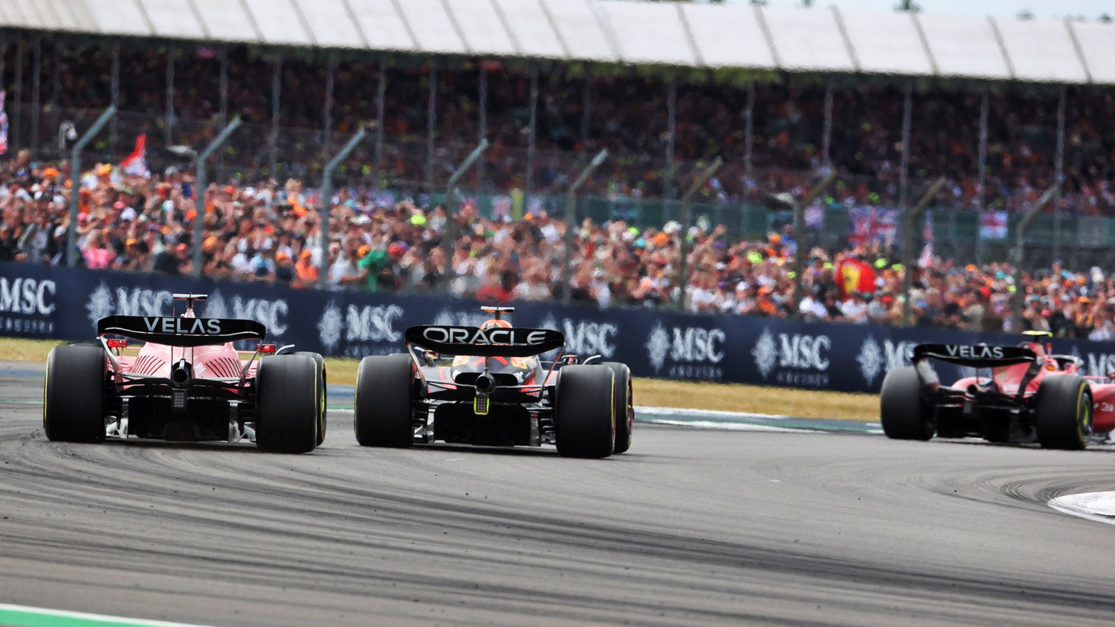Max Verstappen (NLD) Red Bull Racing RB18 leads Carlos Sainz Jr (ESP) Ferrari F1-75. Formula 1 World Championship, Rd 10,