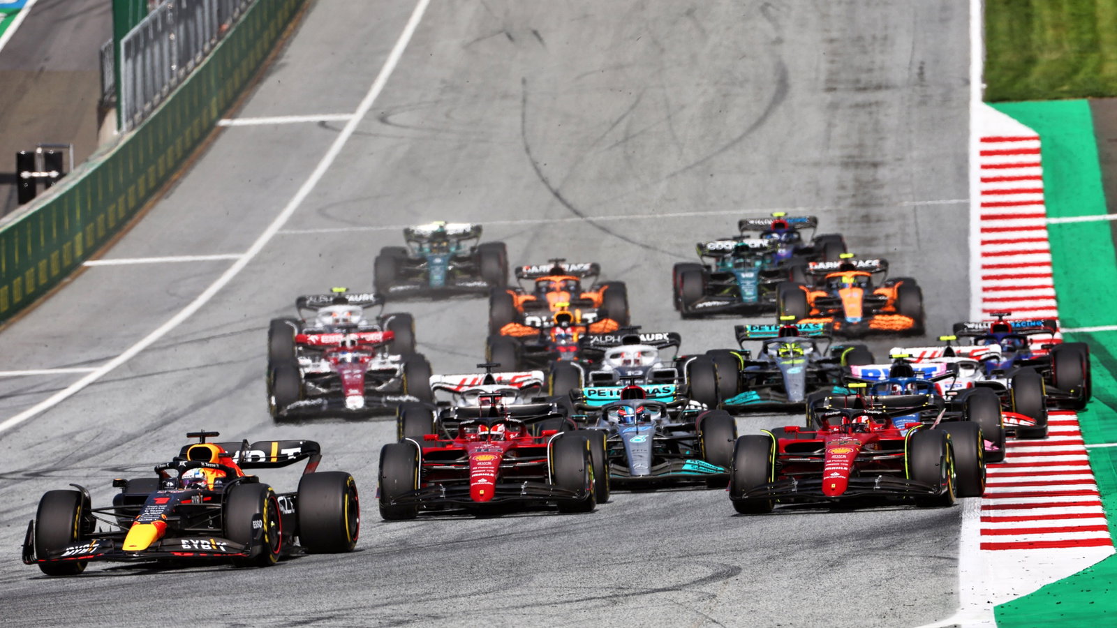 Max Verstappen (NLD) Red Bull Racing RB18 leads at the start. Formula 1 World Championship, Rd 11, Austrian Grand Prix,