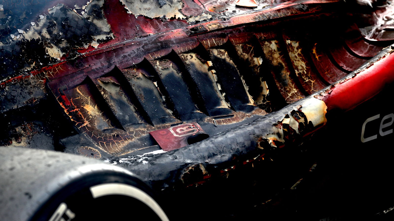 The charred remains of the Ferrari F1-75 