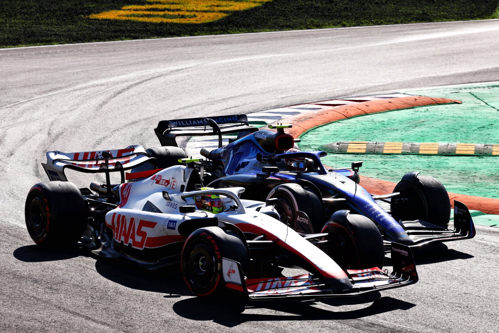 Mick Schumacher (GER) Haas VF-22 and Nicholas Latifi (CDN) Williams Racing FW44 battle for position. Formula 1 World