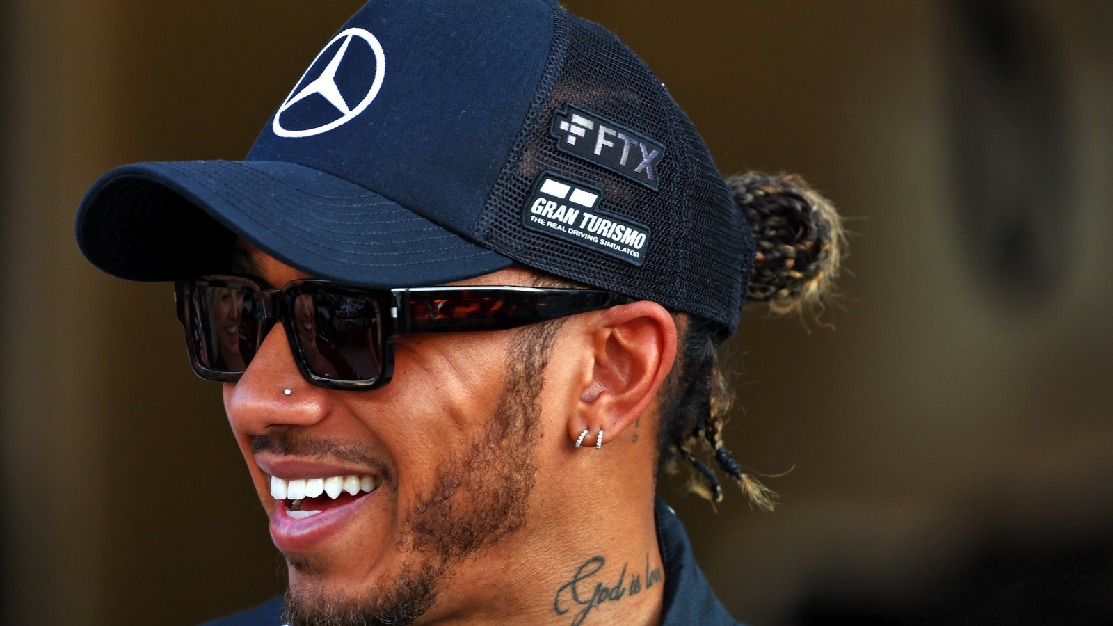 Lewis Hamilton (GBR) Mercedes AMG F1 at a team photograph - the bankrupt FTX branding still showing on his cap. Formula 1