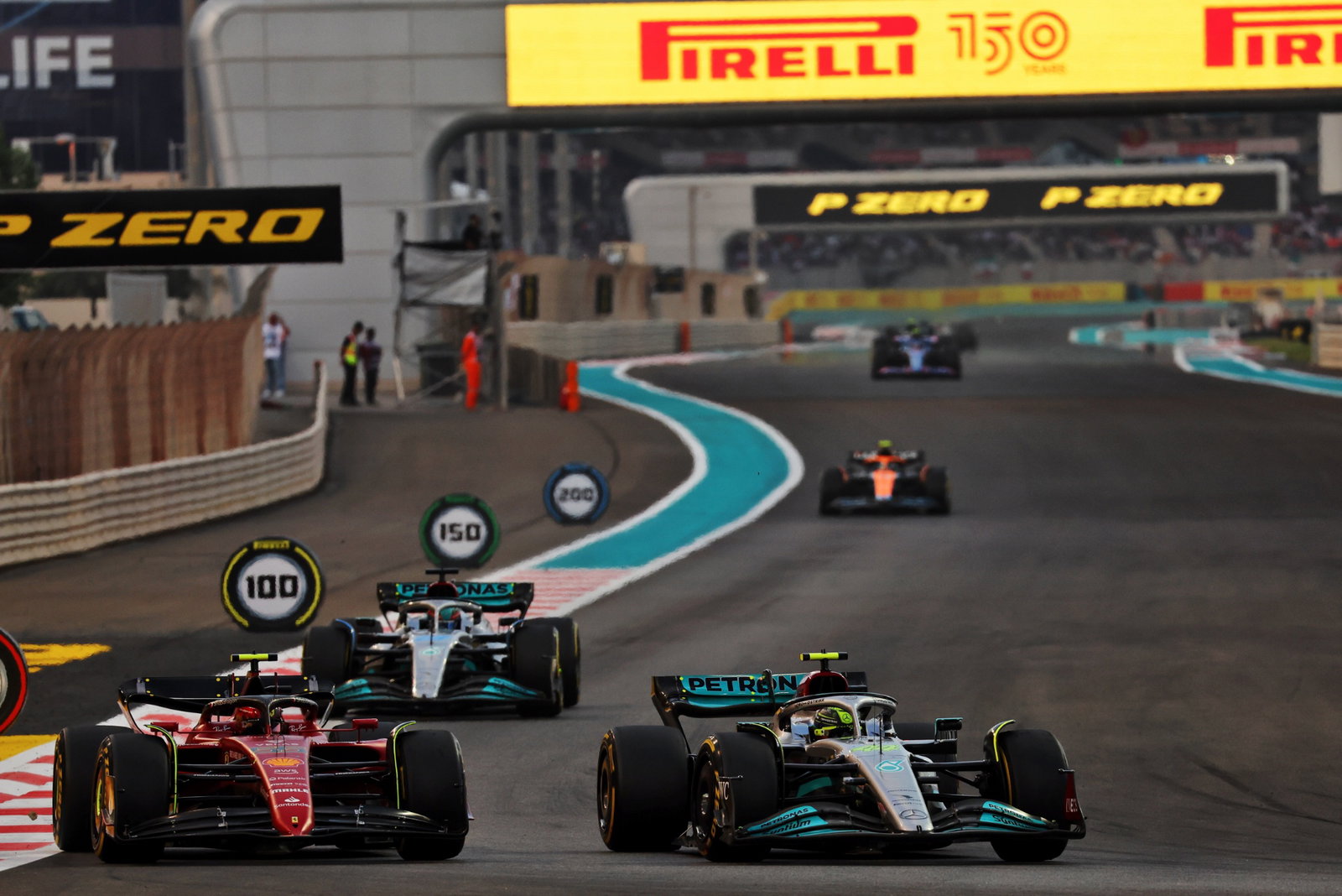 Carlos Sainz Jr (ESP) Ferrari F1-75 and Lewis Hamilton (GBR) Mercedes AMG F1 W13 battle for position. Formula 1 World