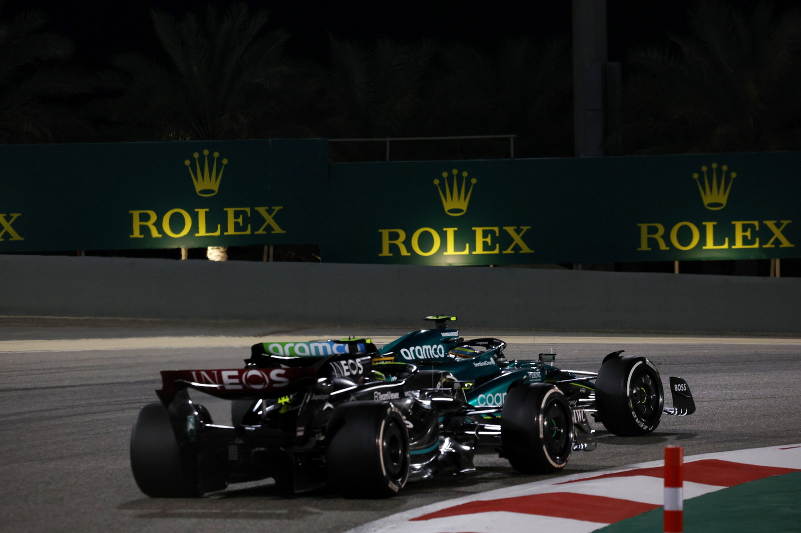 Fernando Alonso (ESP) Aston Martin F1 Team AMR23 leads Lewis Hamilton (GBR) Mercedes AMG F1 W14. Formula 1 World