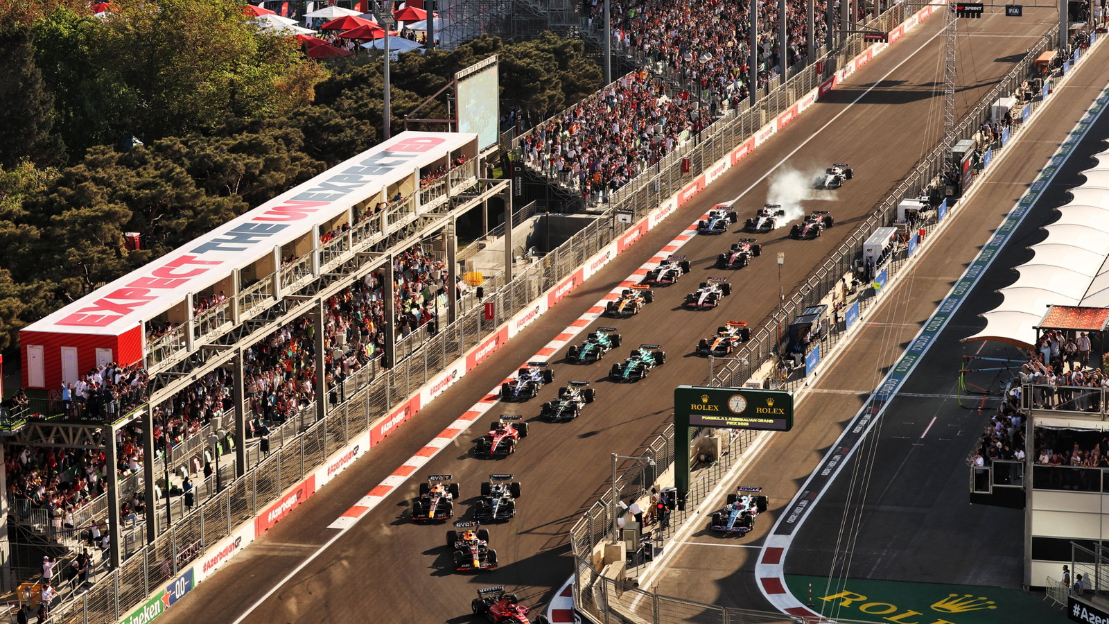 Charles Leclerc (MON) Ferrari SF-23 leads at the start of the Sprint race with Esteban Ocon (FRA) Alpine F1 Team A523