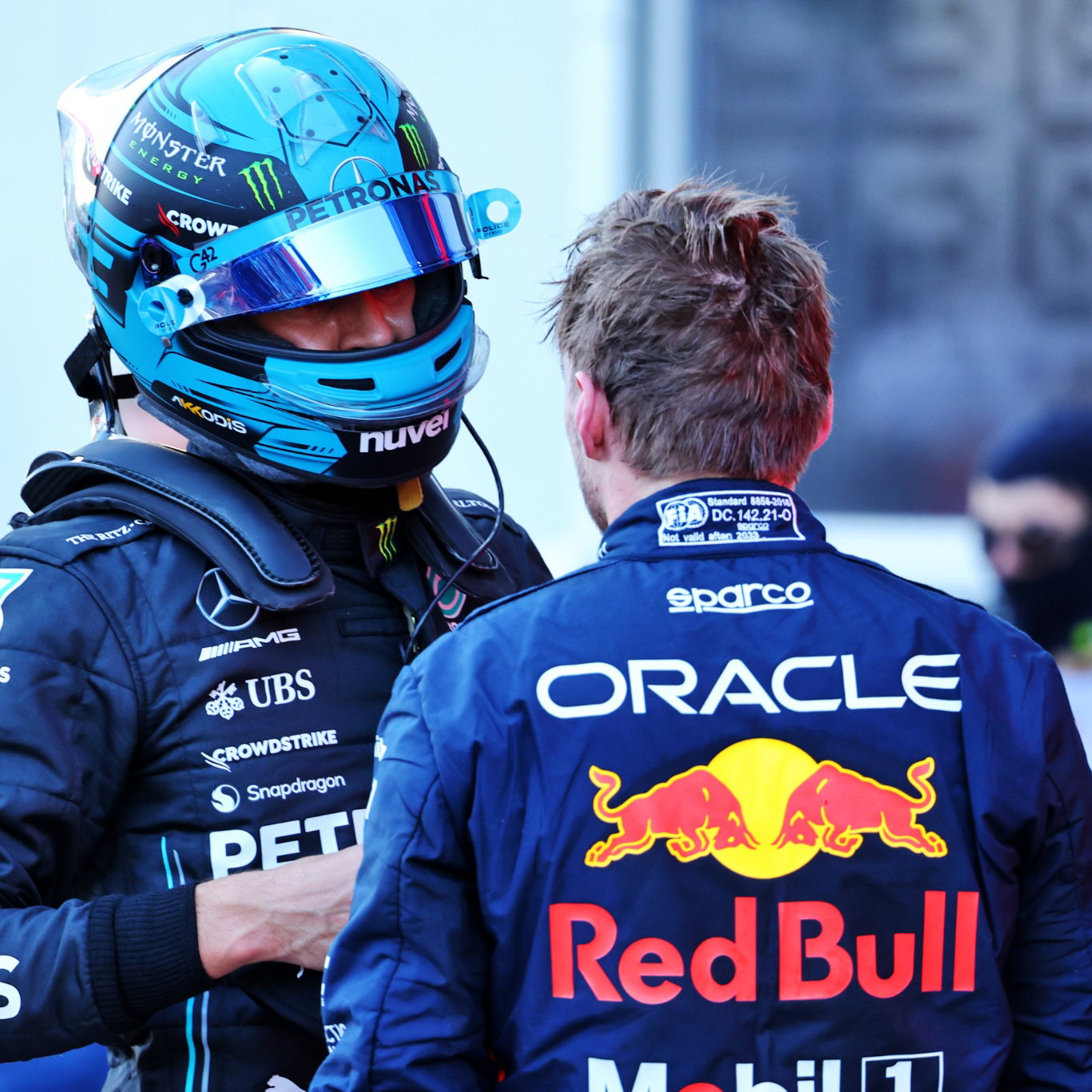 (L to R): George Russell (GBR) Mercedes AMG F1 and Max Verstappen (NLD) Red Bull Racing discuss the Sprint race in parc