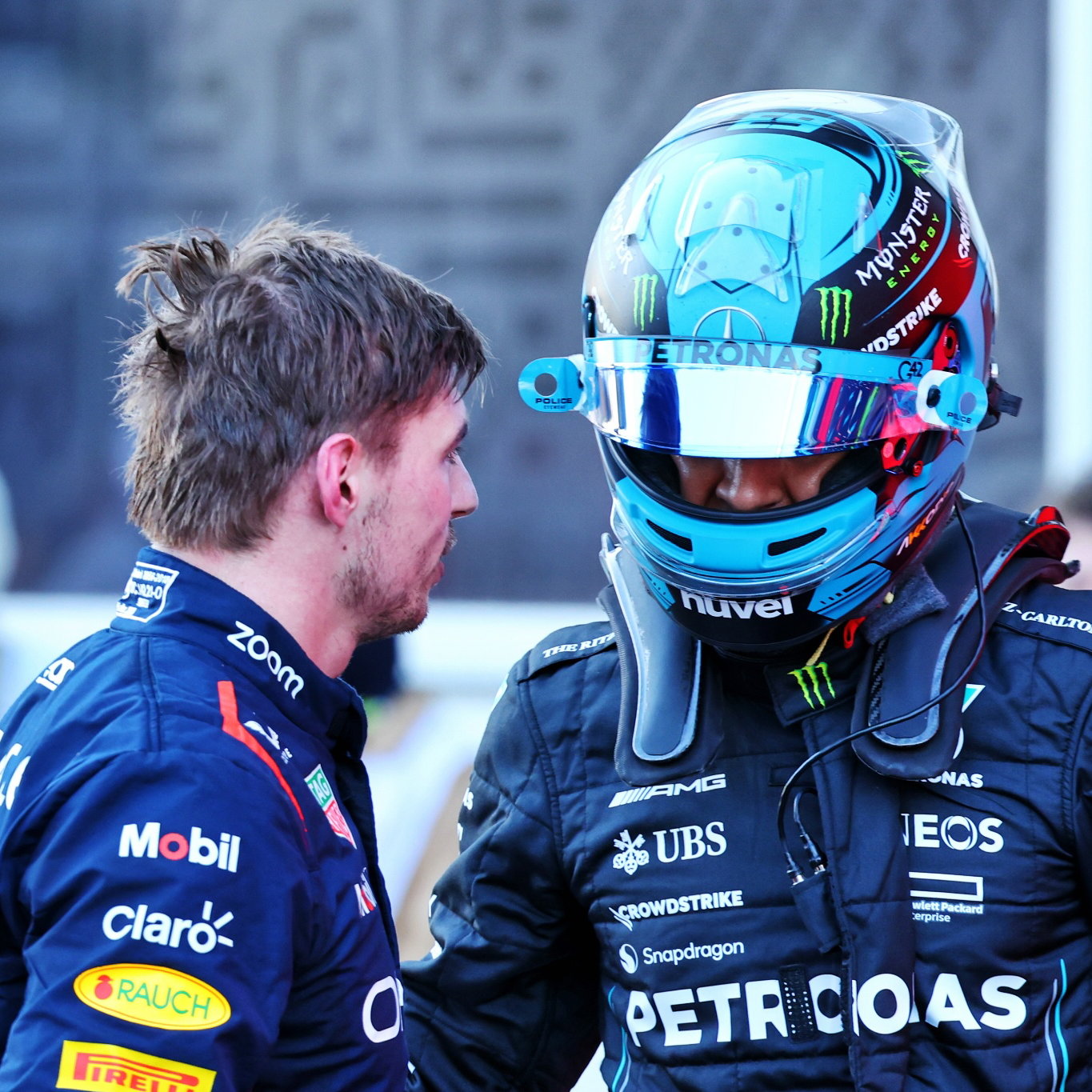 (L to R): Max Verstappen (NLD) Red Bull Racing and George Russell (GBR) Mercedes AMG F1 discuss the Sprint race in parc