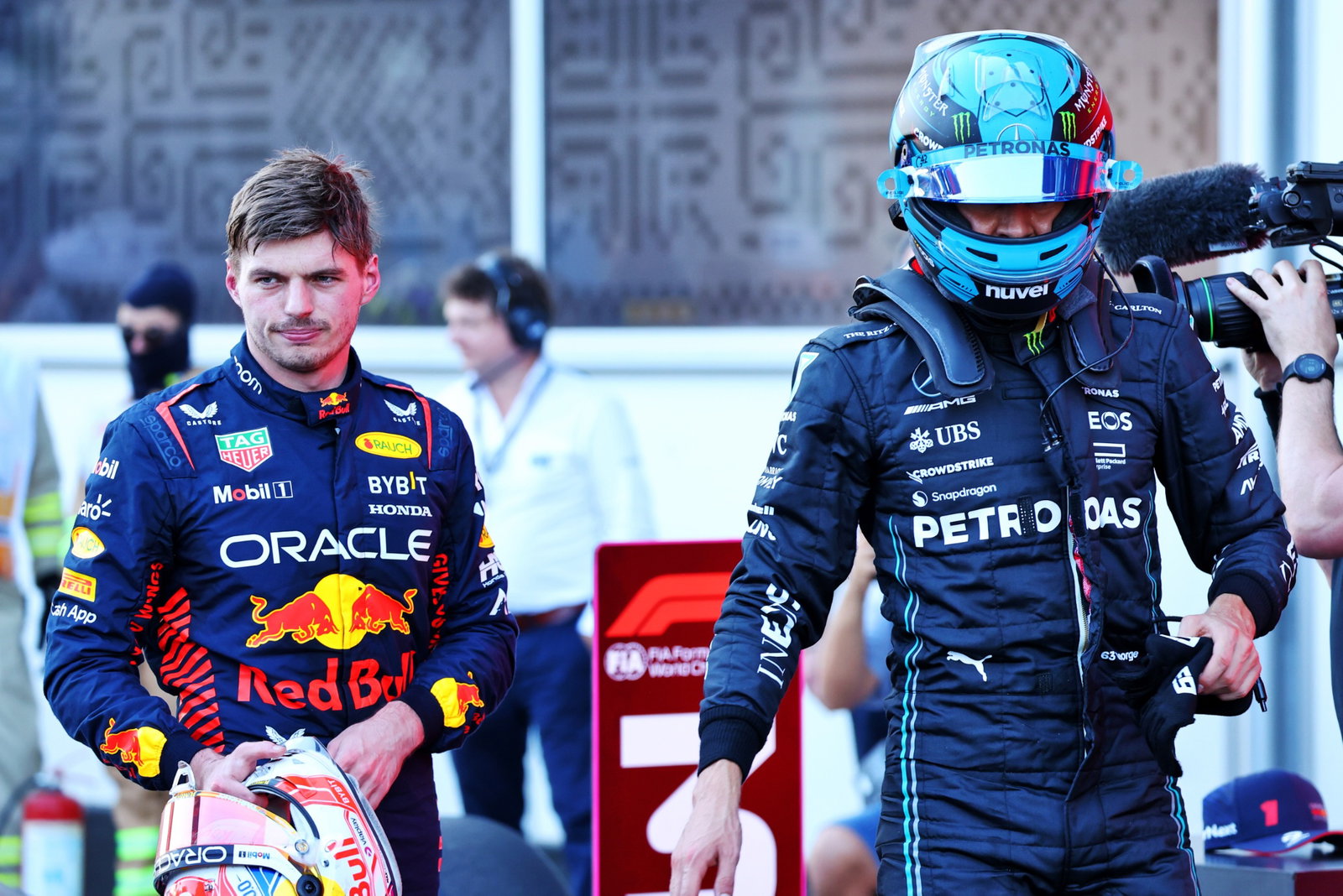 (L to R): Max Verstappen (NLD) Red Bull Racing and George Russell (GBR) Mercedes AMG F1 discuss the Sprint race in parc