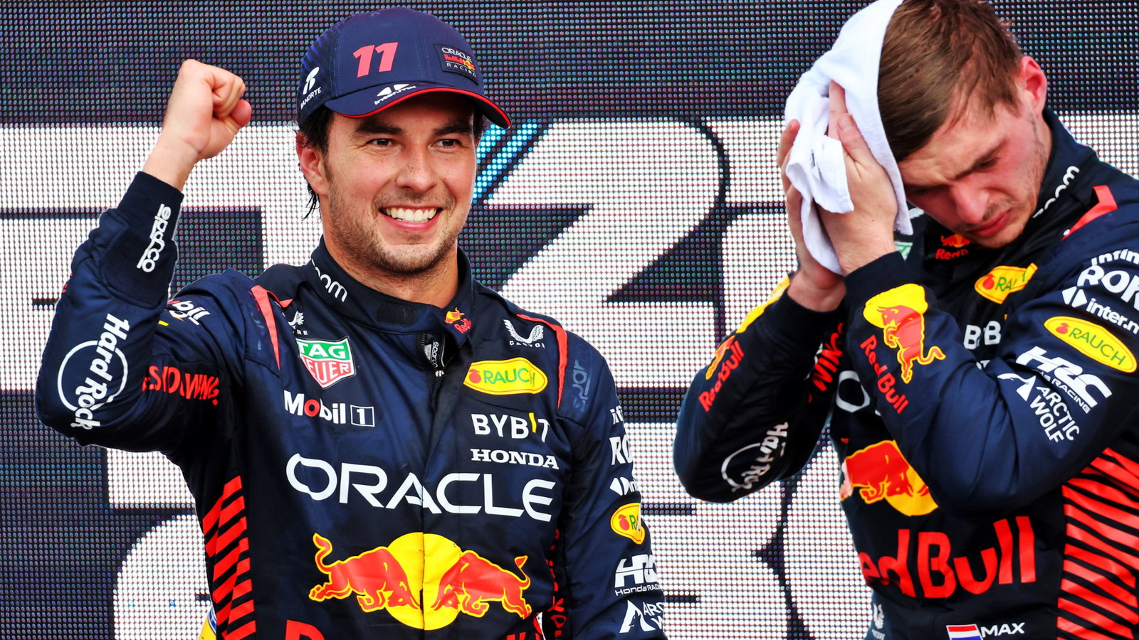 (L to R): Race winner Sergio Perez (MEX) Red Bull Racing celebrates on the podium with second placed team mate Max