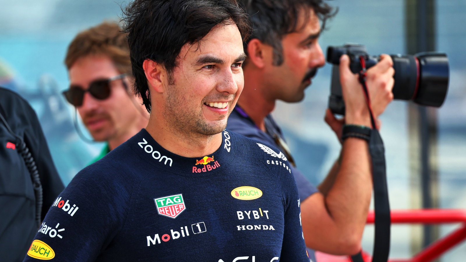Sergio Perez (MEX) Red Bull Racing celebrates his pole position in qualifying parc ferme. Formula 1 World Championship, Rd