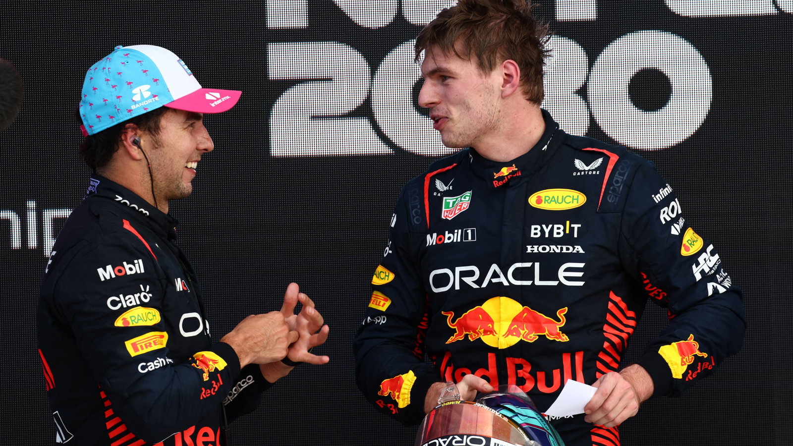 2nd place Sergio Perez (MEX) Red Bull Racing with 1st place Max Verstappen (NLD) Red Bull Racing. Formula 1 World