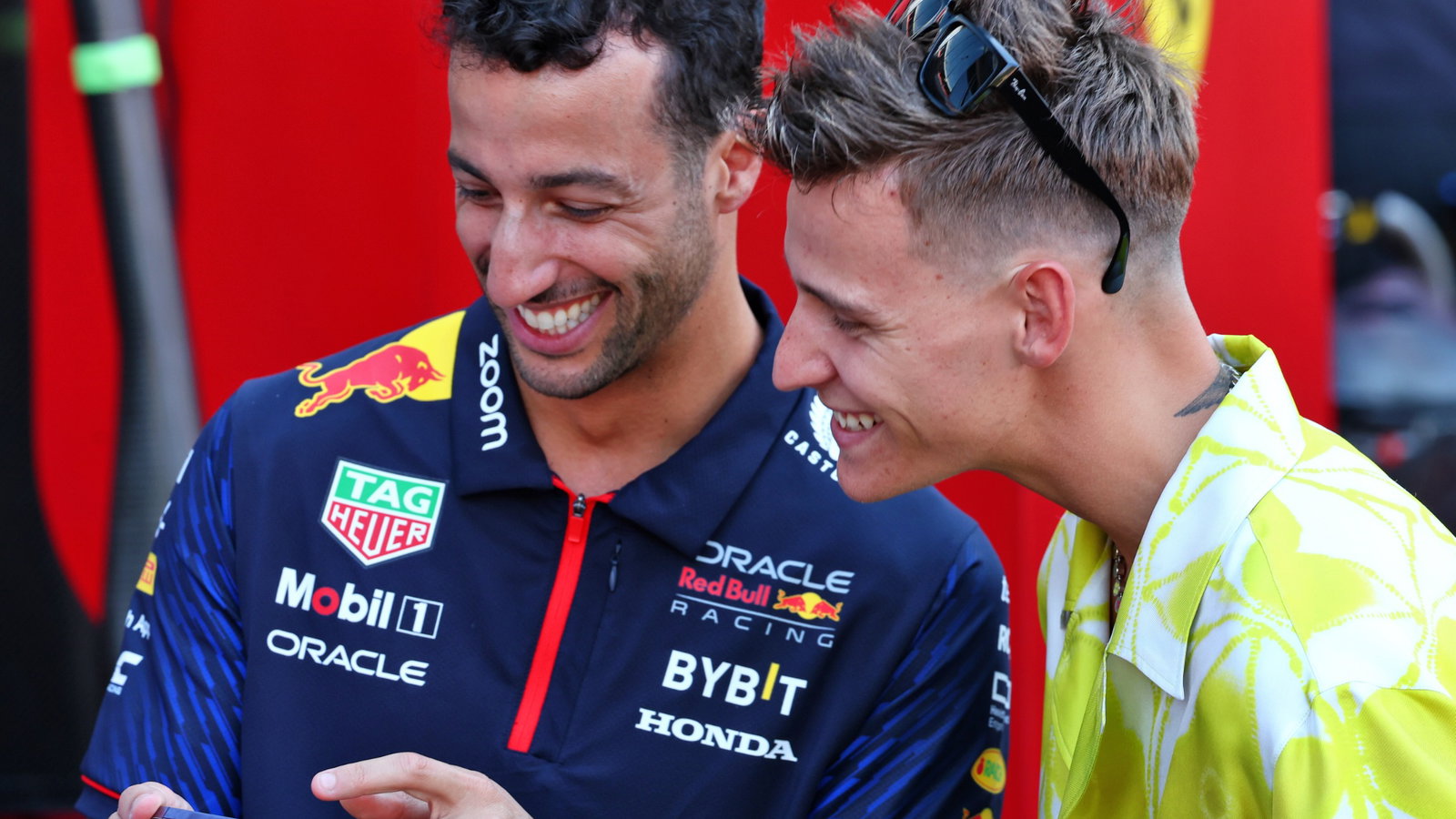 (L to R): Daniel Ricciardo (AUS) Red Bull Racing Reserve and Third Driver with Fabio Quartararo (FRA) MotoGP Motorcycle