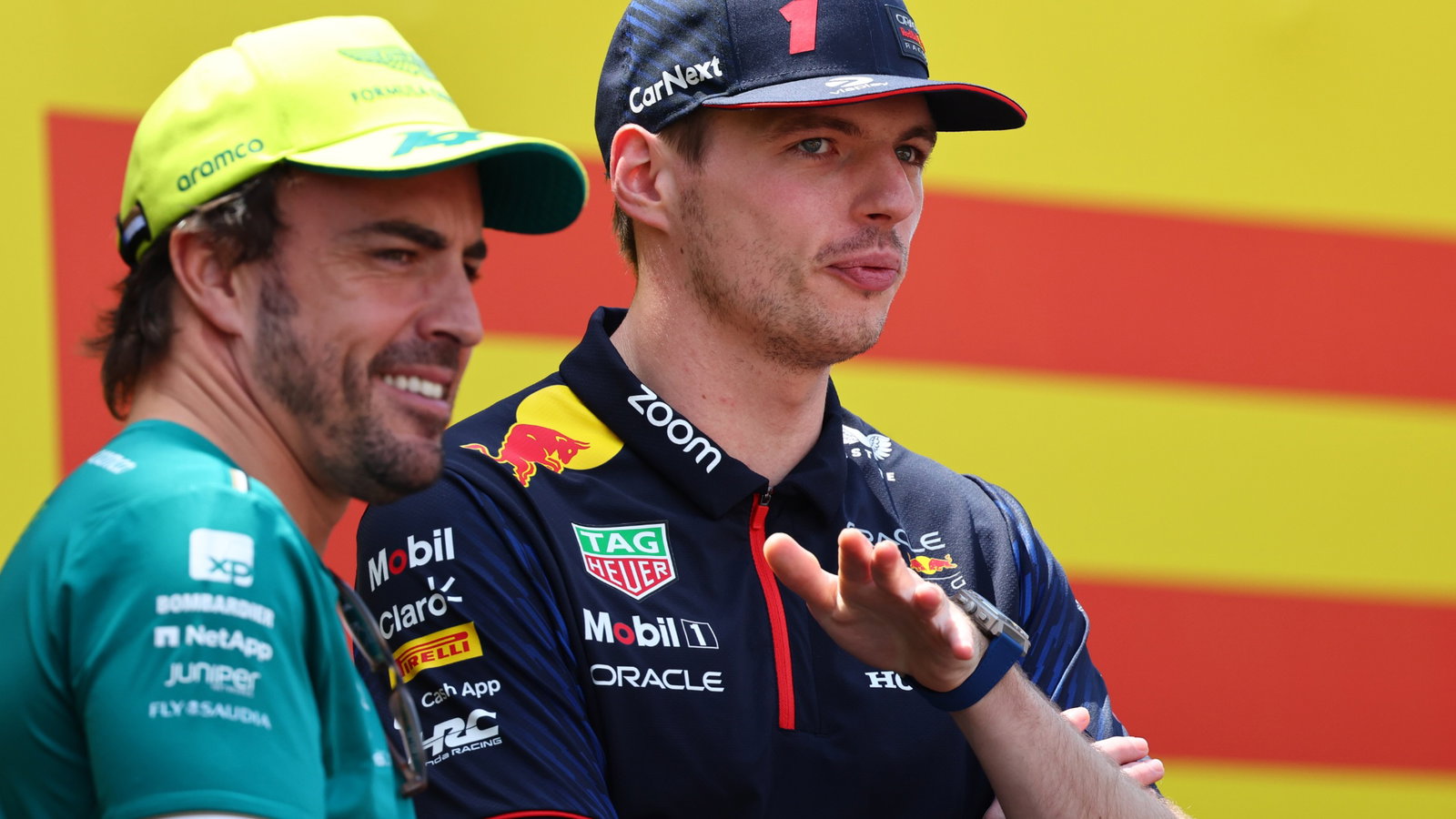 (L to R): Fernando Alonso (ESP) Aston Martin F1 Team and Max Verstappen (NLD) Red Bull 