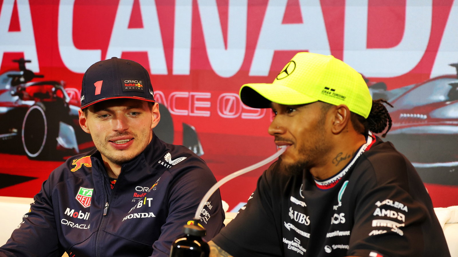 (L to R): Max Verstappen (NLD) Red Bull Racing and Lewis Hamilton (GBR) Mercedes AMG F1 in the post race FIA Press