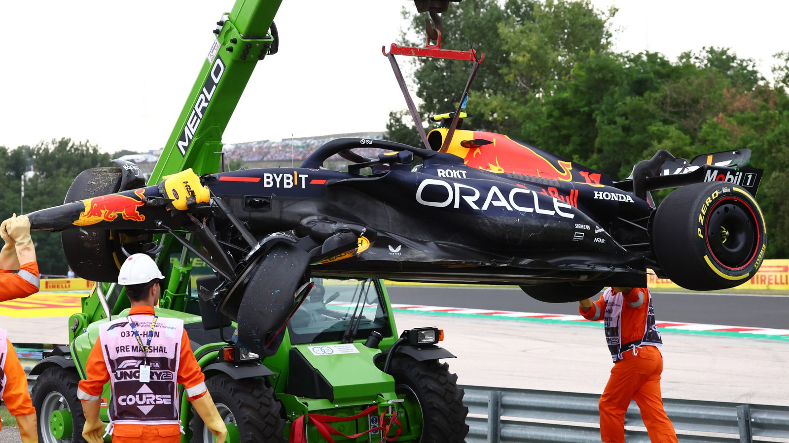 The damaged Red Bull Racing RB19 of Sergio Perez (MEX) is recovered from the circuit. Formula 1 World Championship, Rd 12,