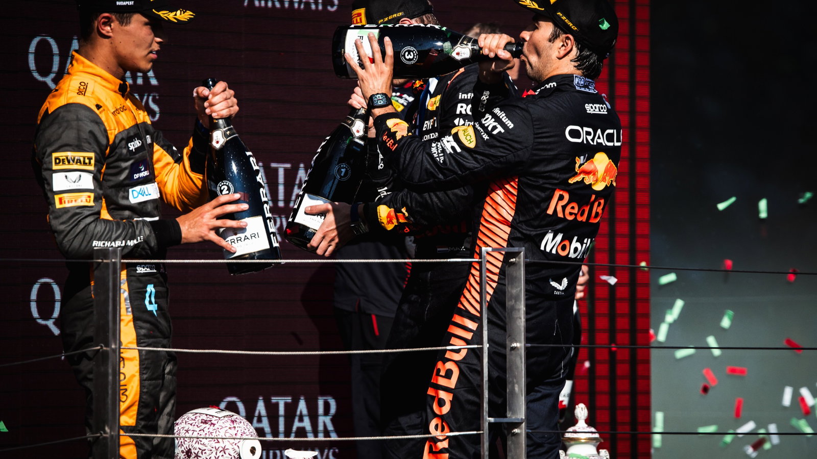 The podium (L to R): Lando Norris (GBR) McLaren, second; Max Verstappen (NLD) Red Bull Racing, race winner; Sergio Perez
