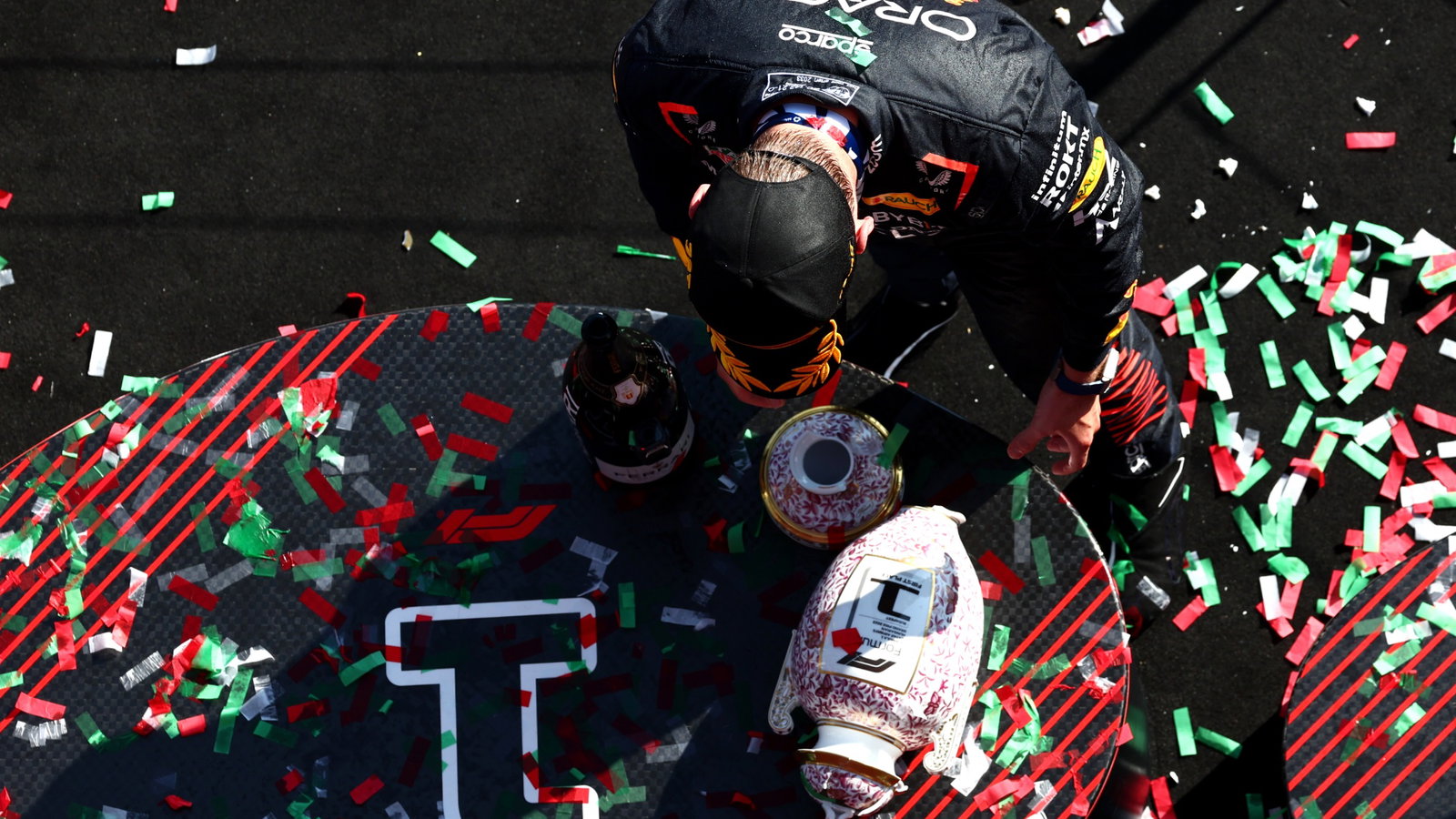 Max Verstappen (NLD) Red Bull Racing retrieves his broken trophy on the podium. Formula 1 World Championship, Rd 12,
