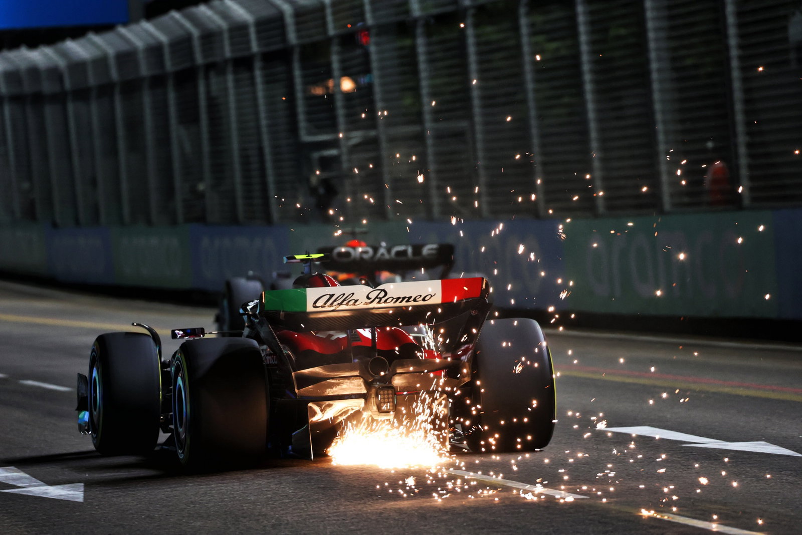 Zhou Guanyu (CHN) Alfa Romeo F1 Team C43 sends sparks flying. Formula 1 World Championship, Rd 16, Singapore Grand Prix,