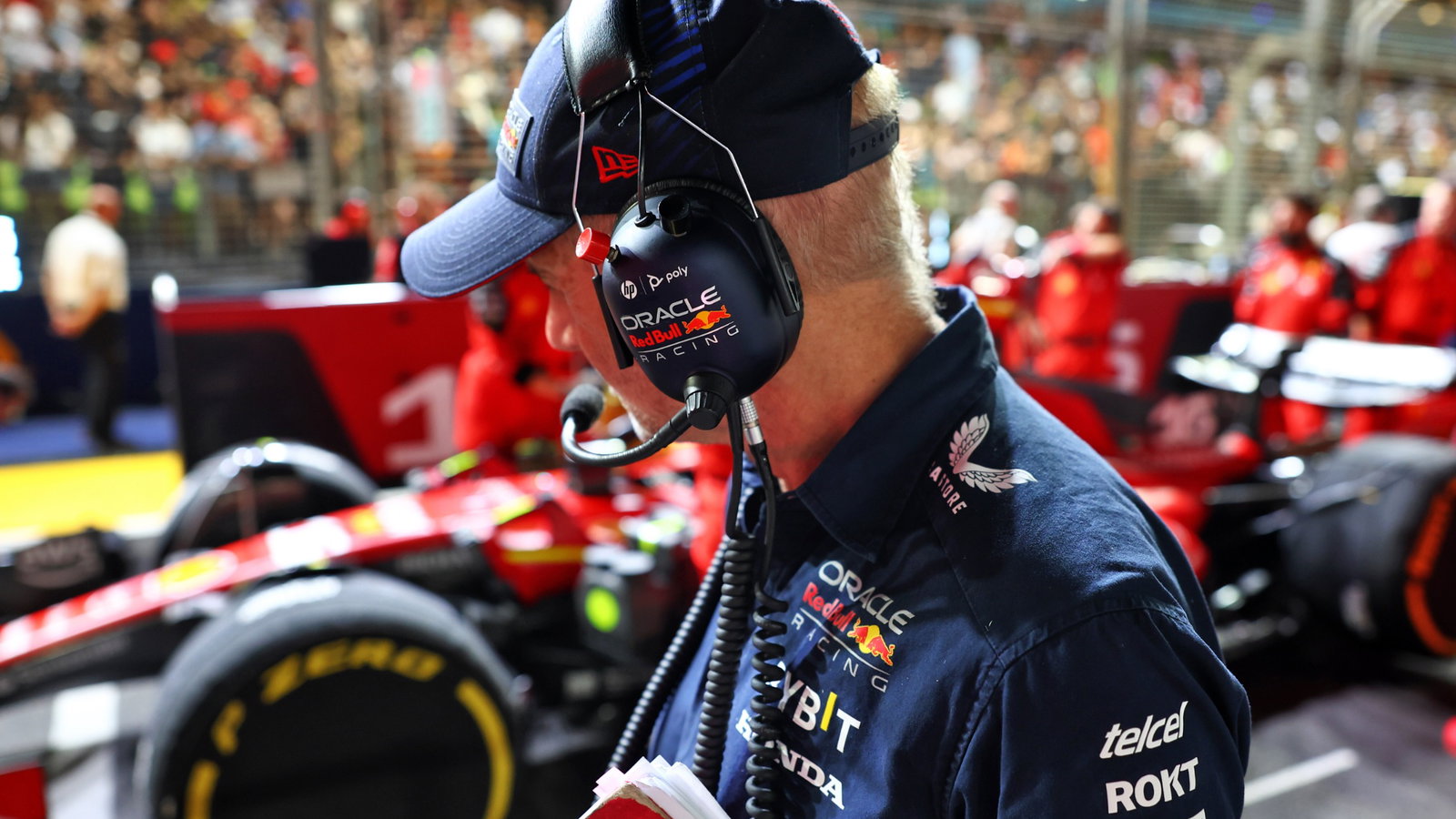 Adrian Newey (GBR) Red Bull Racing Chief Technical Officer looks at Carlos Sainz Jr (ESP) Ferrari SF-23 on the grid.
