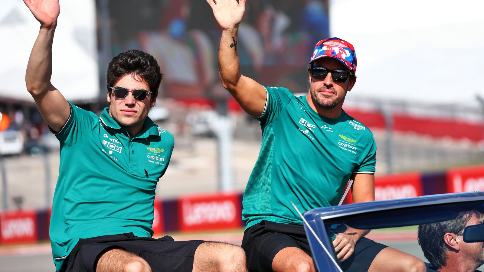 (L to R): Lance Stroll (CDN) Aston Martin F1 Team and Fernando Alonso (ESP) Aston Martin F1 Team on the drivers' parade.
