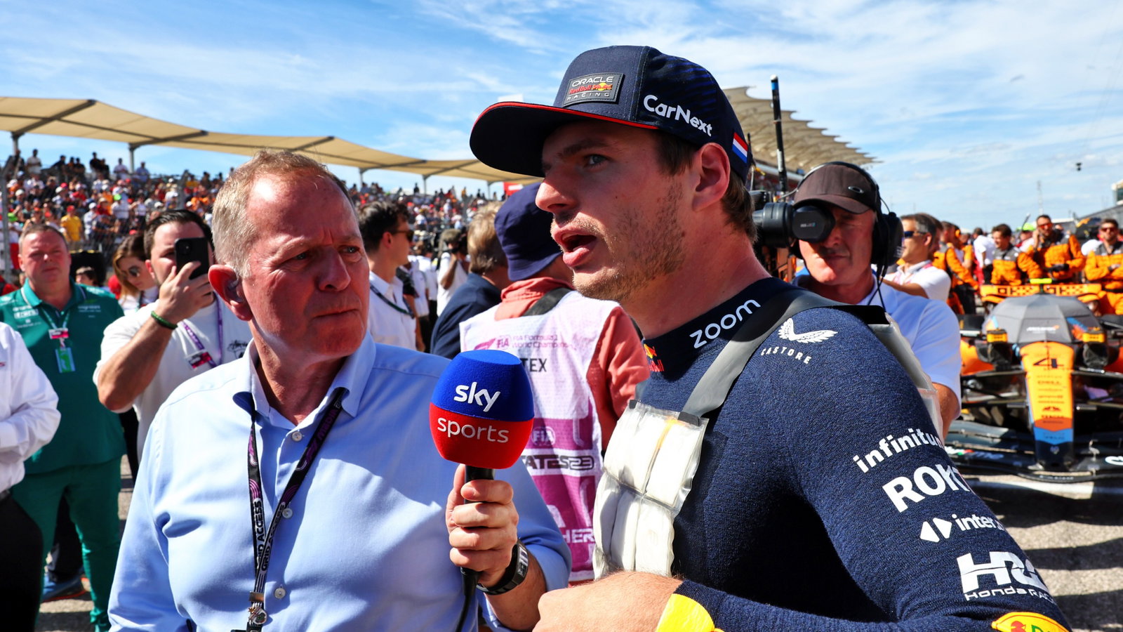 (L to R): Martin Brundle (GBR) Sky Sports Commentator with Max Verstappen (NLD) Red Bull Racing on the grid. Formula 1