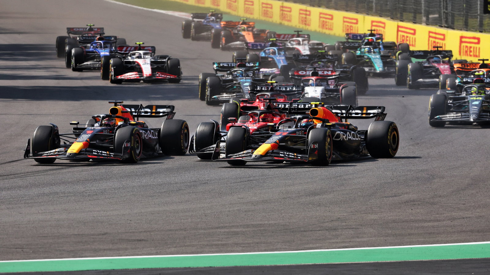 (L to R): Max Verstappen (NLD) Red Bull Racing RB19; Charles Leclerc (MON) Ferrari SF-23; and Sergio Perez (MEX) Red Bull