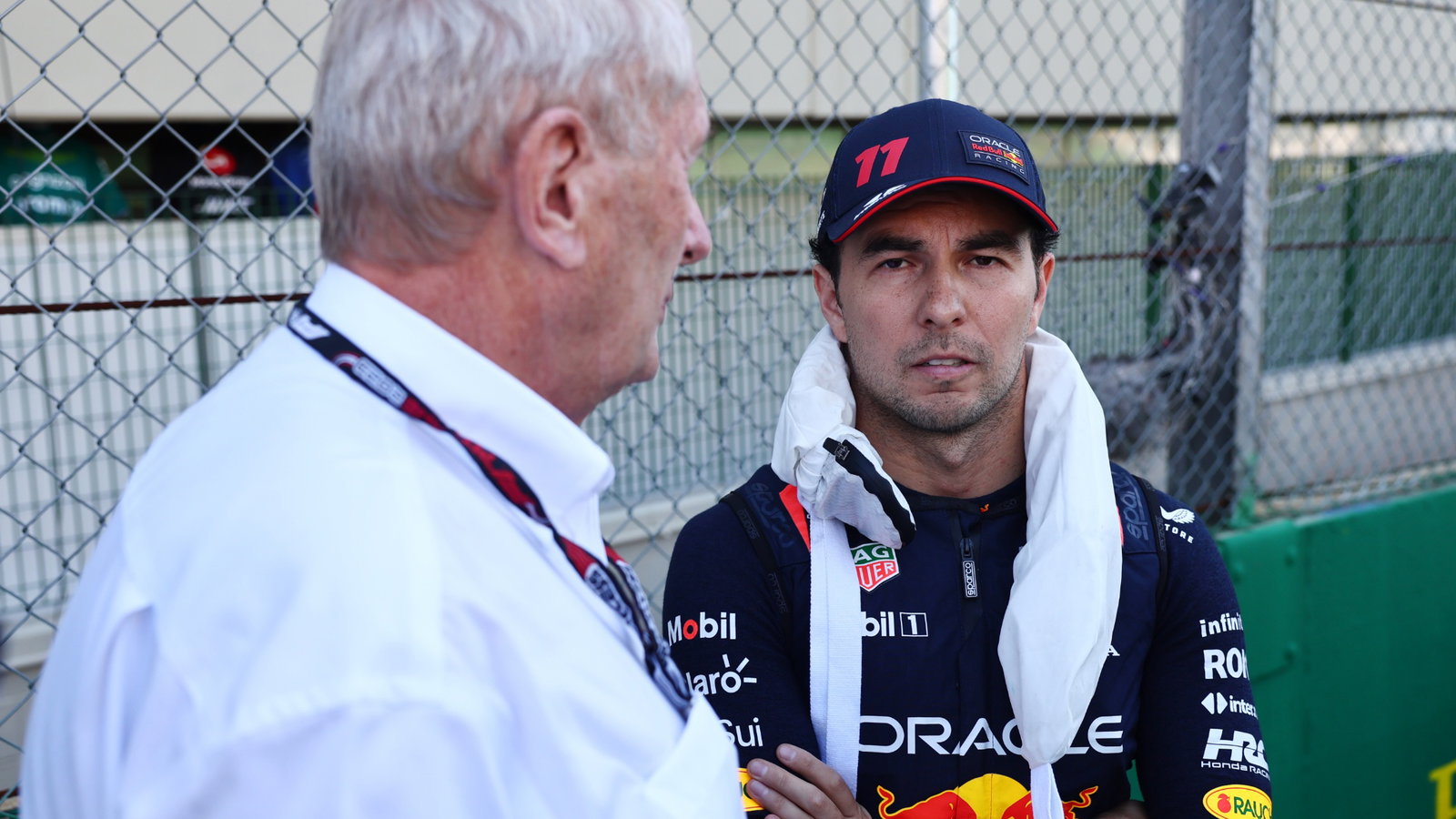 (L to R): Dr Helmut Marko (AUT) Red Bull Motorsport Consultant and Sergio Perez (MEX) Red Bull Racing on the grid. Formula