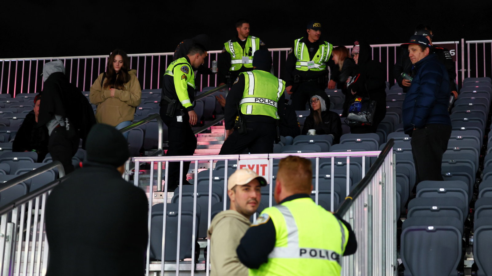Police eject fans from the grandstand