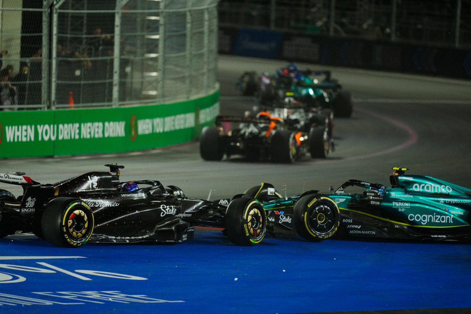Valtteri Bottas (FIN) Alfa Romeo F1 Team C43 and Fernando Alonso (ESP) Aston Martin F1 Team AMR23 at the start of the