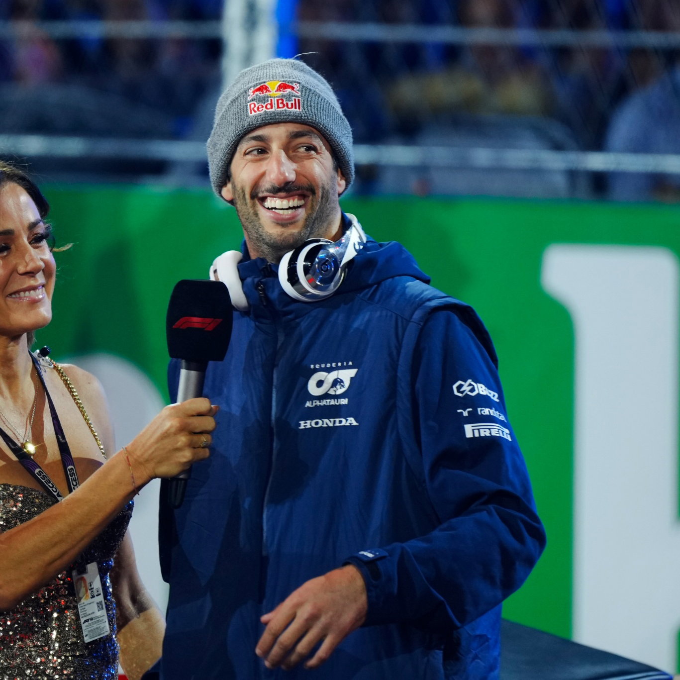 (L to R): Natalie Pinkham (GBR) Sky Sports Presenter with Daniel Ricciardo (AUS) AlphaTauri on the drivers' parade.
