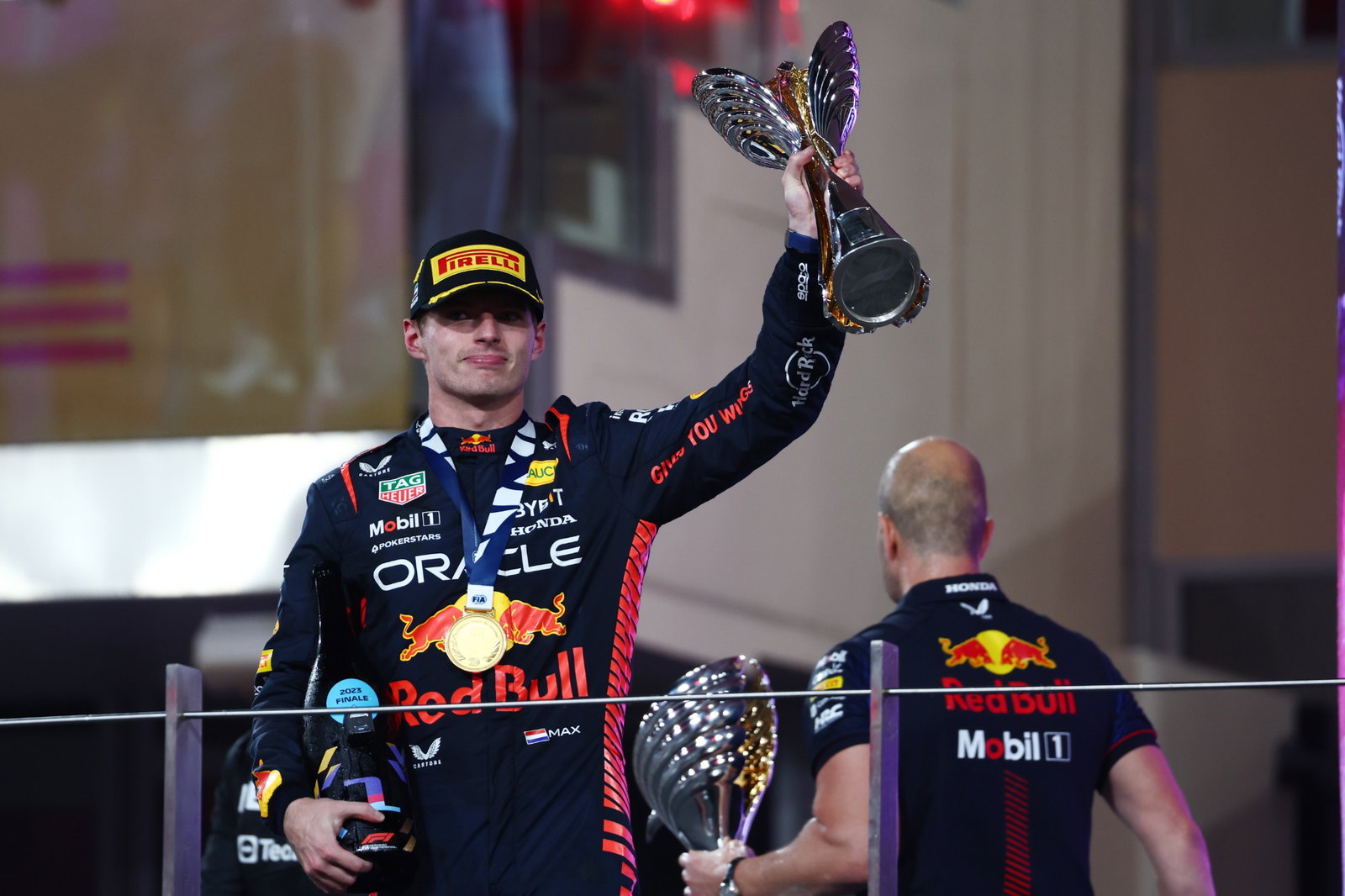 Race winner Max Verstappen (NLD) Red Bull Racing celebrates on the podium. Formula 1 World Championship, Rd 23, Abu Dhabi
