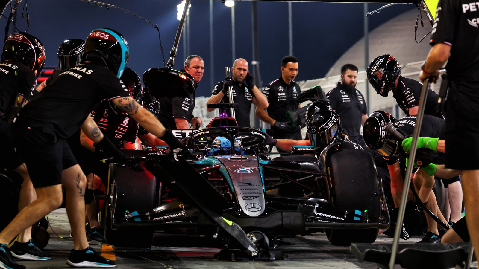 George Russell (GBR) Mercedes AMG F1 W15 practices a pit stop. Formula 1 Testing, Sakhir, Bahrain, Day Three. -