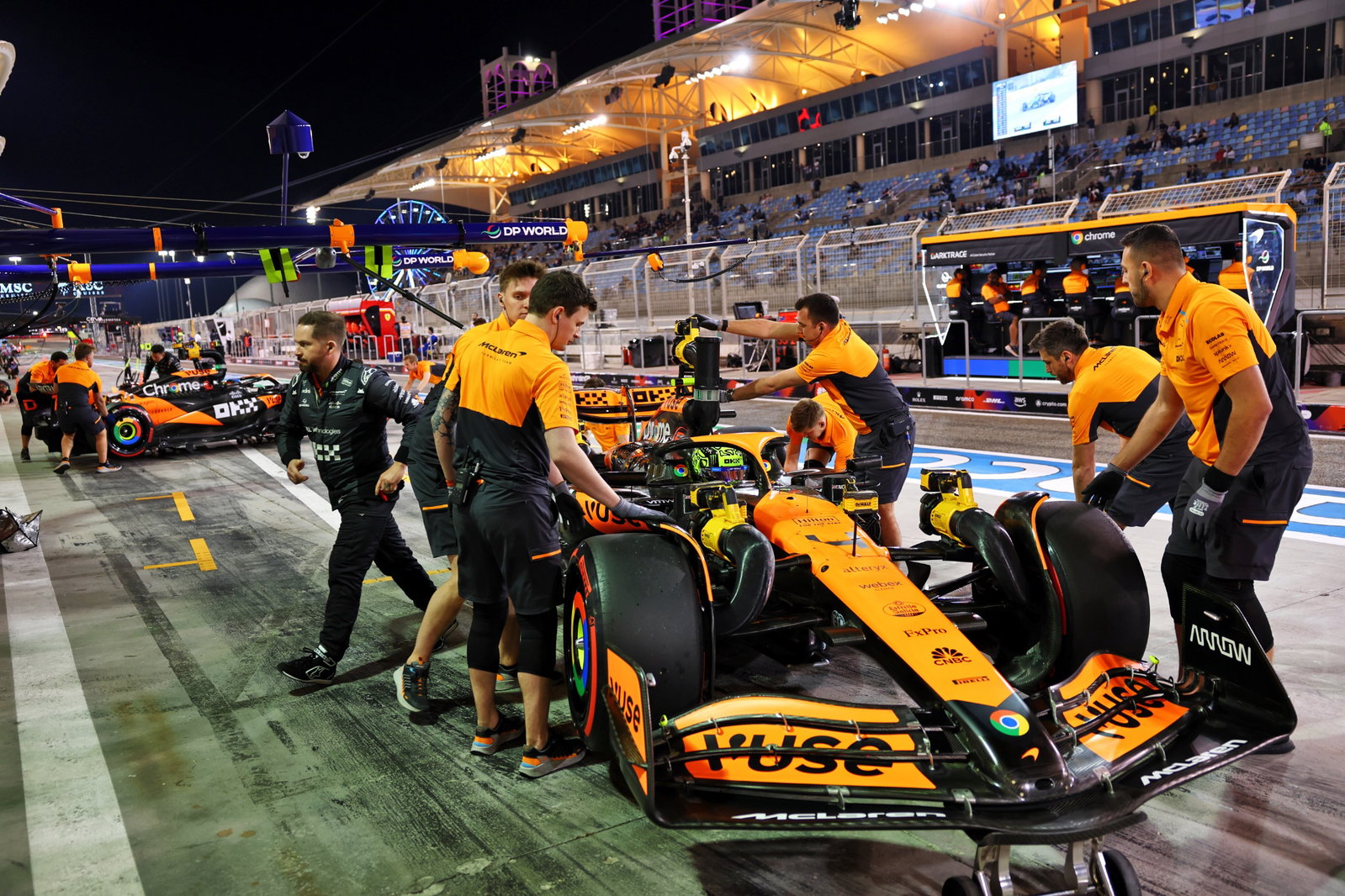 Lando Norris (GBR) McLaren MCL38 and Oscar Piastri (AUS) McLaren MCL38 in the pits. Formula 1 World Championship, Rd 1,