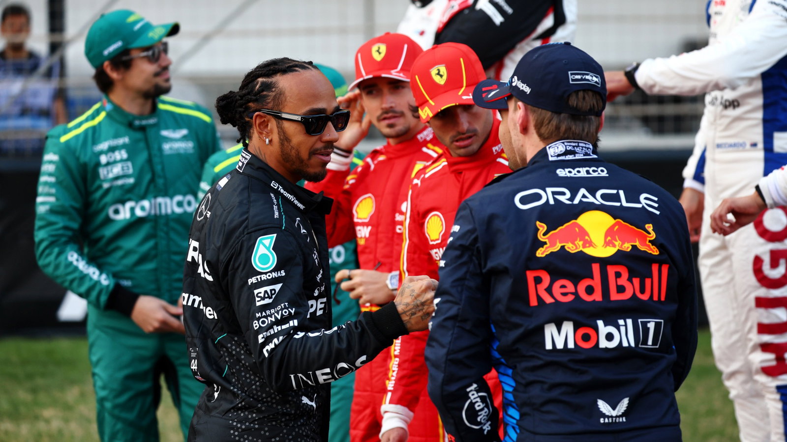 Lewis Hamilton (GBR) Mercedes AMG F1 with Sergio Perez (MEX) Red Bull Racing and Max Verstappen (NLD) Red Bull Racing.