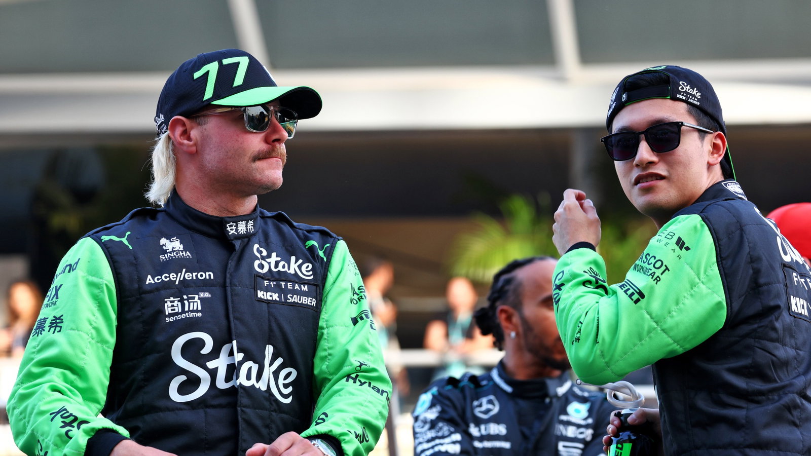 (L to R): Valtteri Bottas (FIN) Sauber with team mate Zhou Guanyu (CHN) Sauber on the drivers' parade. Formula 1 World