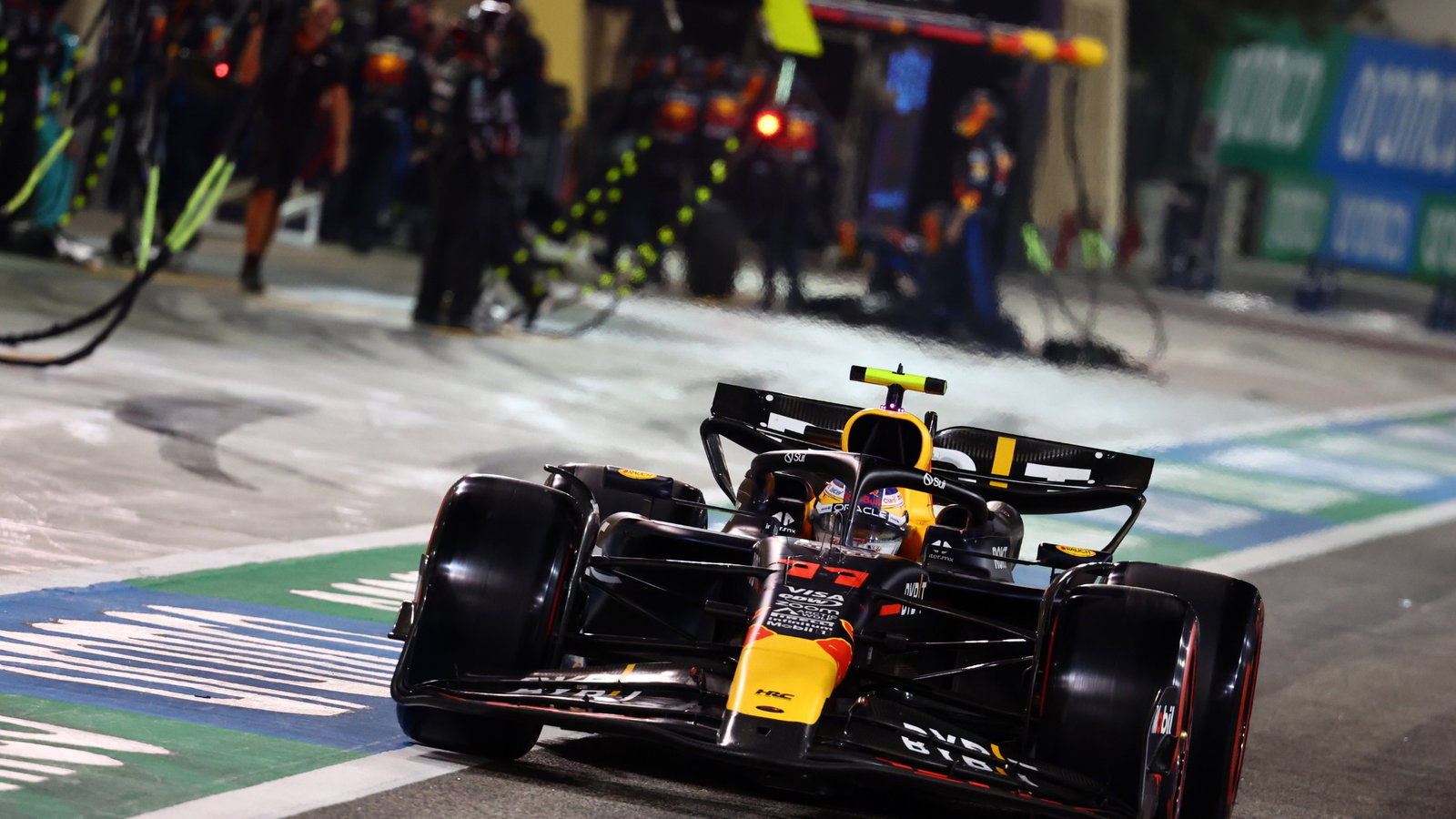 Sergio Perez (MEX) Red Bull Racing RB20 leaves the pits. Formula 1 World Championship, Rd 1, Bahrain Grand Prix, Sakhir,