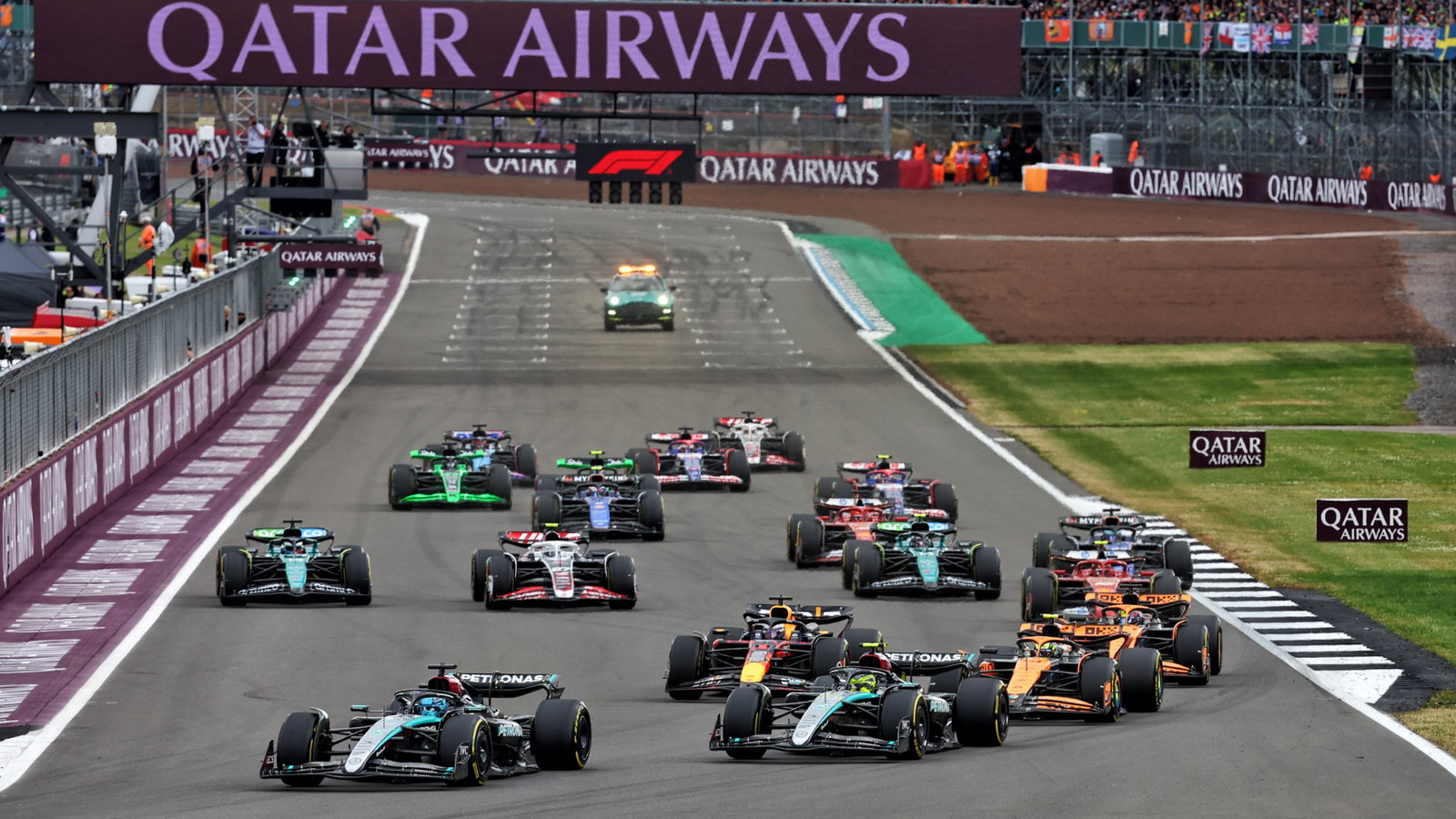 George Russell (GBR) Mercedes AMG F1 W15 leads at the start of the race. Formula 1 World Championship, Rd 12, British