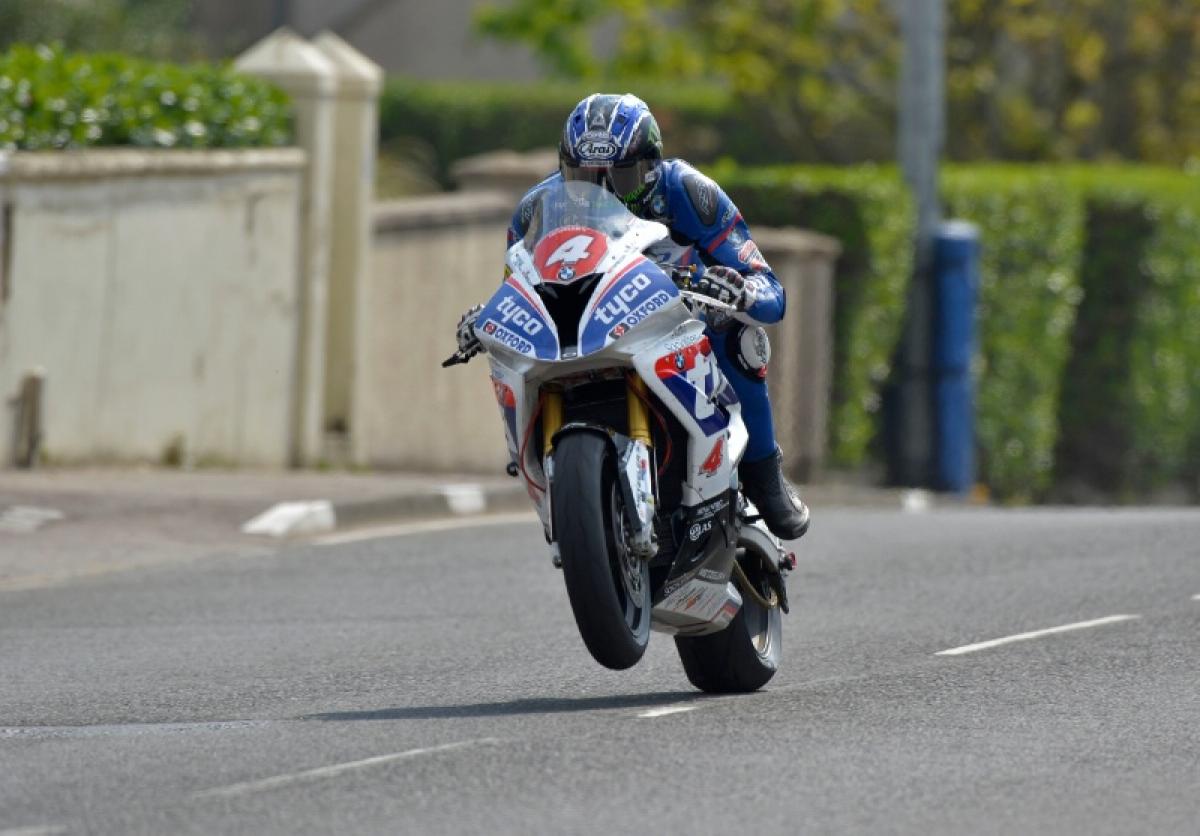 NW200: Dunlop smashes record for Superbike win